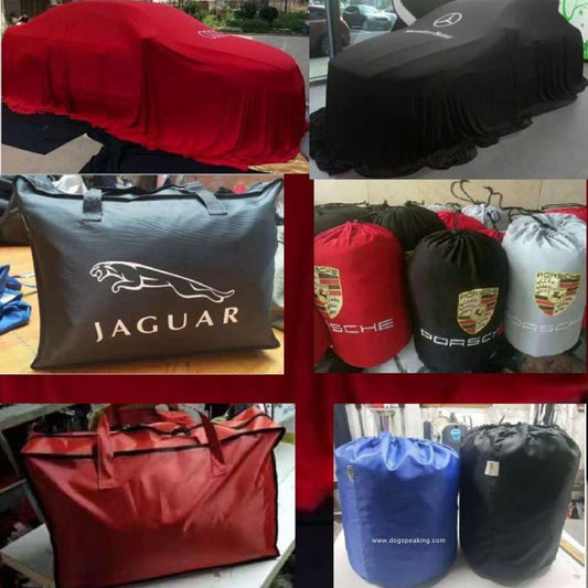 Red and black satin car covers plus labeled storage bags