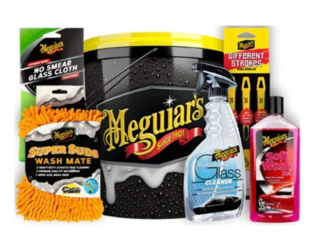 Meguiar's Supreme Shine car detailing kit with pads, cleaner, and wax bottles